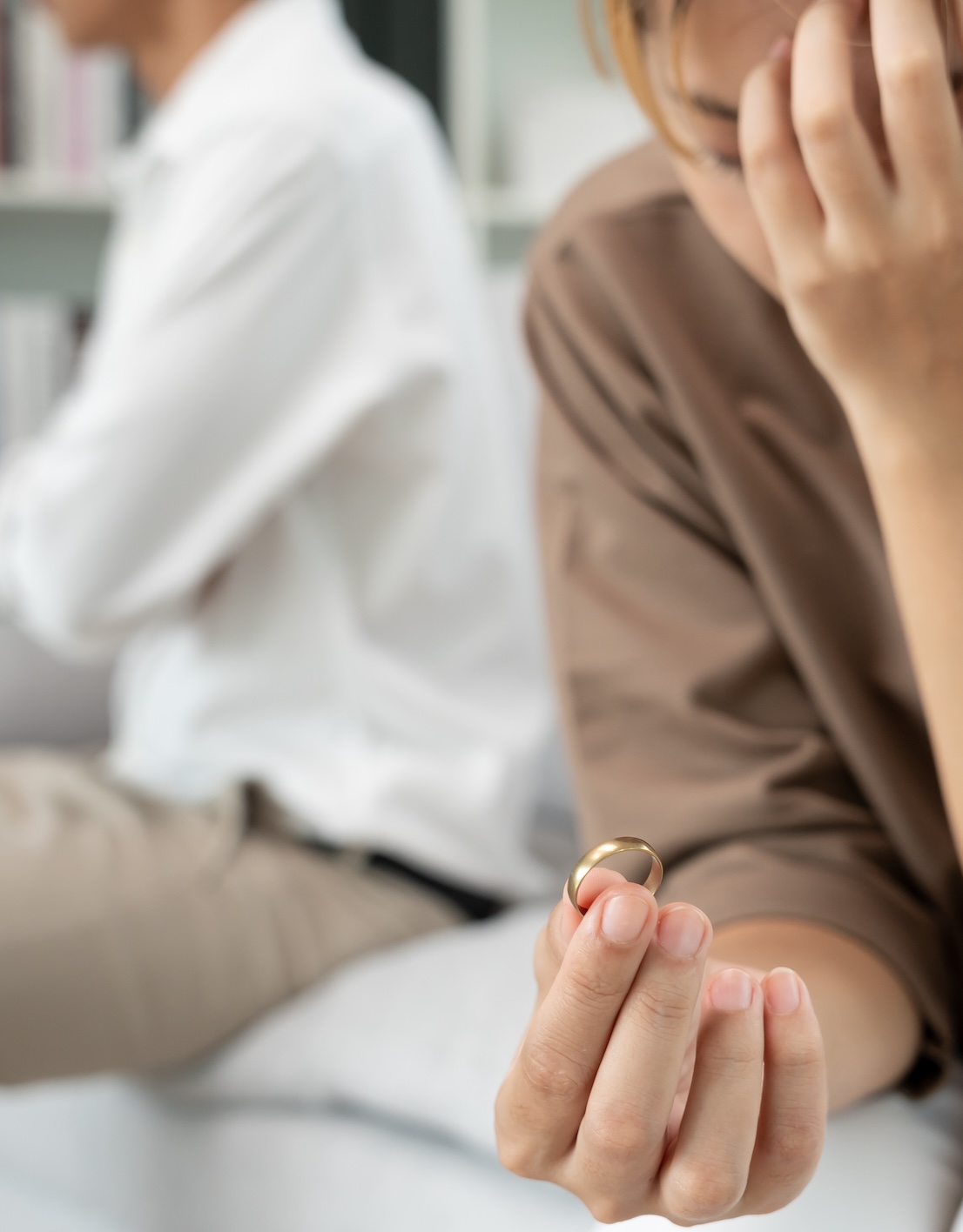 woman holding a ring